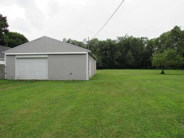 3105 N 26th St, Kalamazoo, MI 49048 - view of grassy yard with a garage and an outbuilding