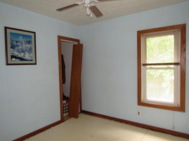 3105 N 26th St, Kalamazoo, MI 49048 - unfurnished room featuring ceiling fan and light carpet