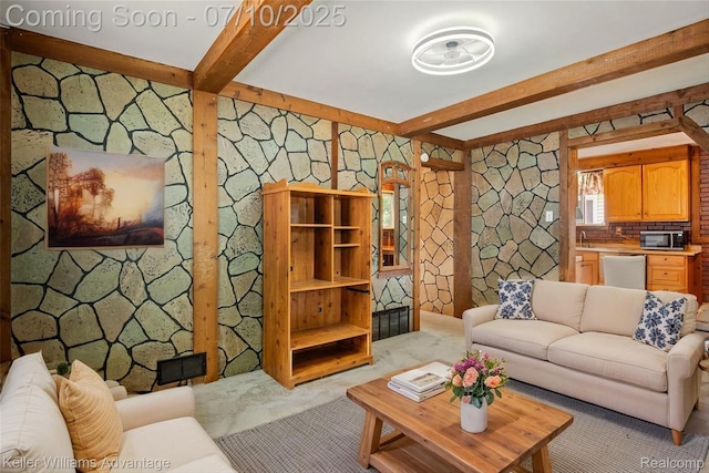 7536 Arcola St, Westland, MI 48185 - living area featuring beamed ceiling and carpet flooring