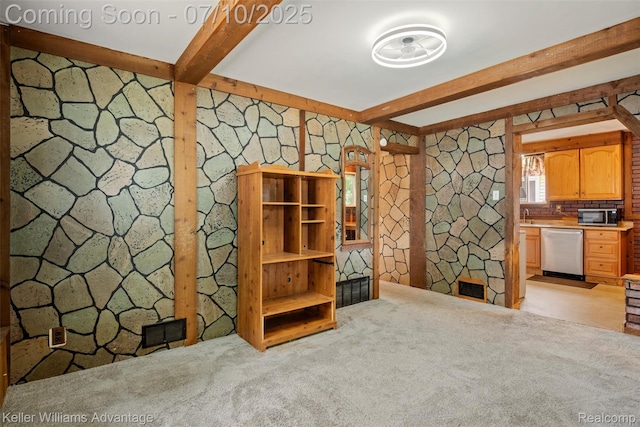7536 Arcola St, Westland, MI 48185 - unfurnished living room with light colored carpet and beamed ceiling