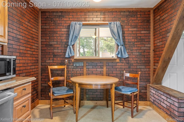 7536 Arcola St, Westland, MI 48185 - dining room with brick wall
