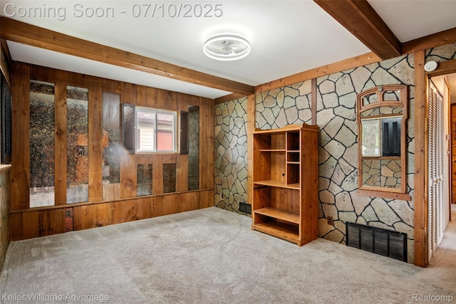 7536 Arcola St, Westland, MI 48185 - carpeted spare room featuring beamed ceiling and wooden walls