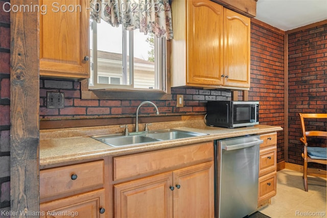 7536 Arcola St, Westland, MI 48185 - kitchen with stainless steel dishwasher, black microwave, light countertops, brick wall, and light brown cabinets