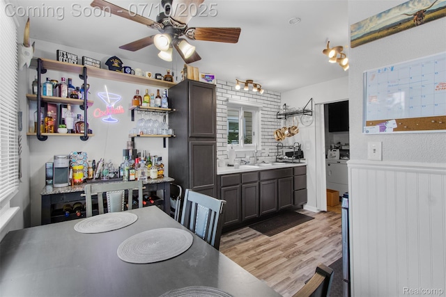 6336 Glenis St, Taylor, MI 48180 - kitchen featuring open shelves, a ceiling fan, light wood-type flooring, and light countertops