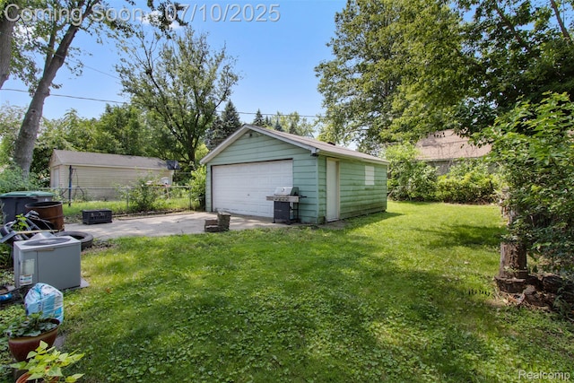 6336 Glenis St, Taylor, MI 48180 - view of yard with a garage and an outbuilding