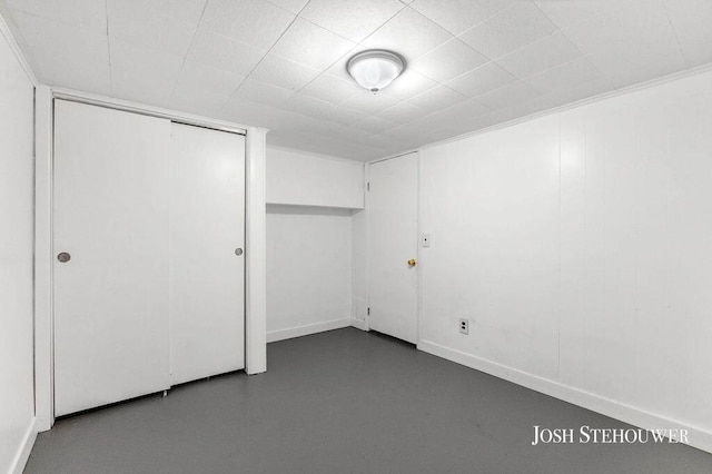 678 Pierce Rd, Plainwell, MI 49080 - unfurnished bedroom featuring concrete flooring and a closet