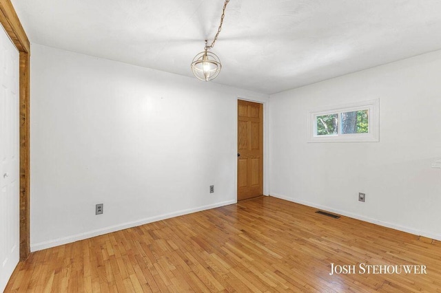 678 Pierce Rd, Plainwell, MI 49080 - empty room featuring light wood-type flooring and baseboards