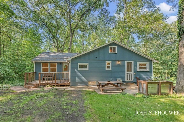 678 Pierce Rd, Plainwell, MI 49080 - rear view of property featuring a deck, a yard, and a patio