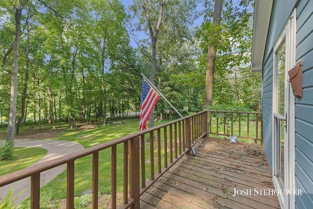 678 Pierce Rd, Plainwell, MI 49080 - deck featuring a yard