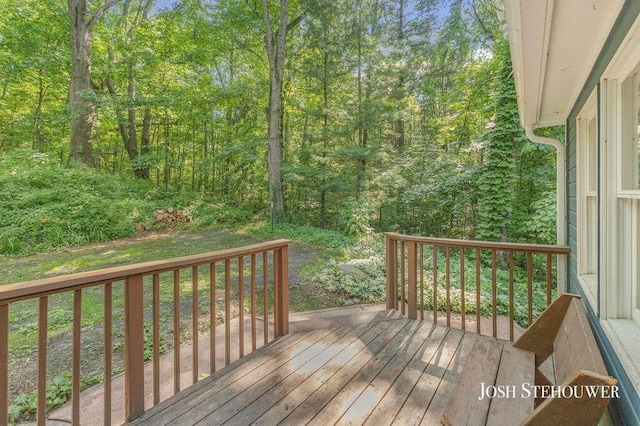 678 Pierce Rd, Plainwell, MI 49080 - wooden deck with a view of trees