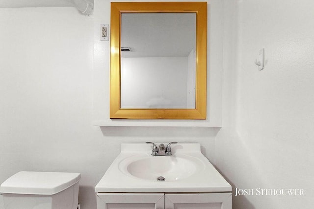 678 Pierce Rd, Plainwell, MI 49080 - bathroom with toilet and vanity