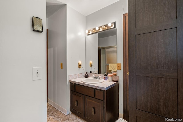 2650 N Lake George Rd, Metamora, MI 48455 - bathroom featuring vanity and baseboards