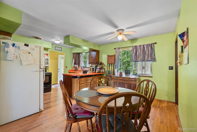 2650 N Lake George Rd, Metamora, MI 48455 - dining area featuring a ceiling fan and light wood finished floors