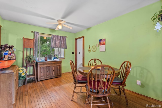 2650 N Lake George Rd, Metamora, MI 48455 - dining room featuring a ceiling fan and wood-type flooring