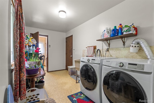 2650 N Lake George Rd, Metamora, MI 48455 - laundry area featuring washer and dryer and light floors
