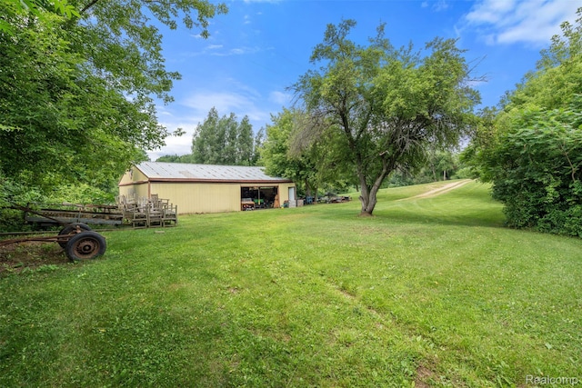 2650 N Lake George Rd, Metamora, MI 48455 - view of green lawn featuring an outbuilding and an outdoor structure