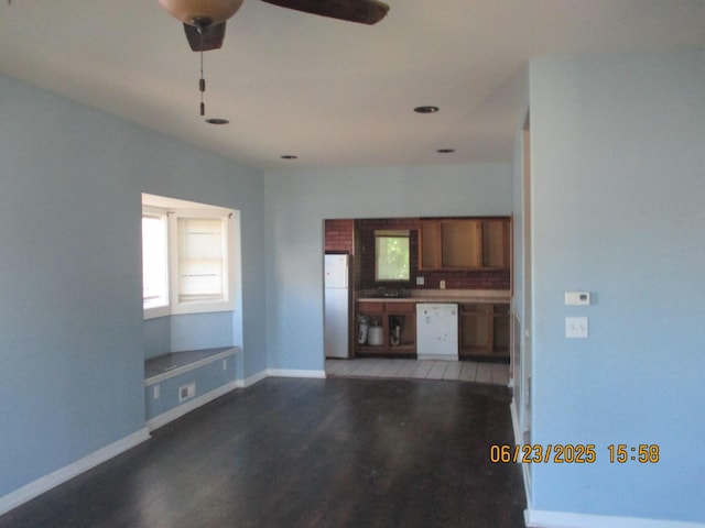 112 E Green St, Hastings, MI 49058 - unfurnished living room featuring wood finished floors, a ceiling fan, and recessed lighting