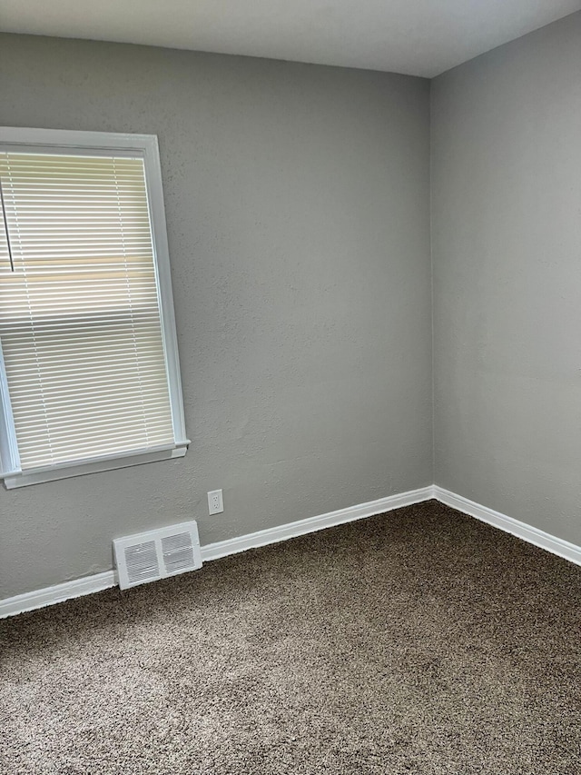 20174 San Juan Dr, Detroit, MI 48221 - unfurnished room with dark carpet