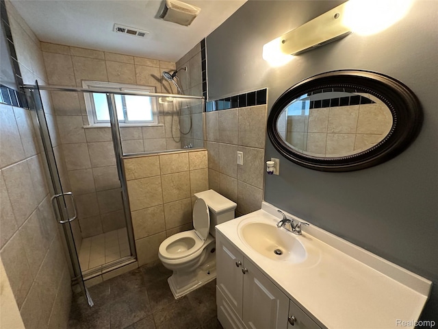 18455 Centralia, Redford, MI 48240 - full bath with a stall shower, vanity, tile walls, and tile patterned floors