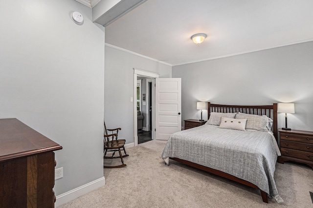 412 N Robert St, Ludington, MI 49431 - carpeted bedroom with ornamental molding and baseboards