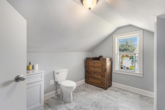 412 N Robert St, Ludington, MI 49431 - bathroom with lofted ceiling and marble finish flooring