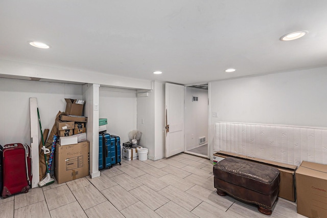 412 N Robert St, Ludington, MI 49431 - finished basement with recessed lighting and wood finish floors
