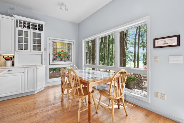 630 N 2nd St, Kalamazoo, MI 49009 - dining room featuring light wood finished floors and baseboards