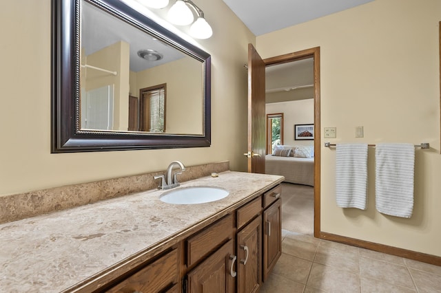 630 N 2nd St, Kalamazoo, MI 49009 - full bath featuring vanity, tile patterned floors, and ensuite bathroom