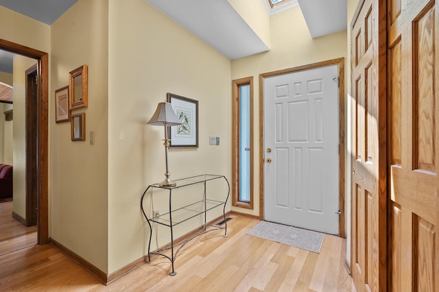 630 N 2nd St, Kalamazoo, MI 49009 - entrance foyer featuring light wood finished floors and a skylight