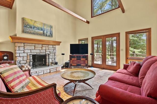 630 N 2nd St, Kalamazoo, MI 49009 - living room with a high ceiling, plenty of natural light, wood finished floors, and french doors