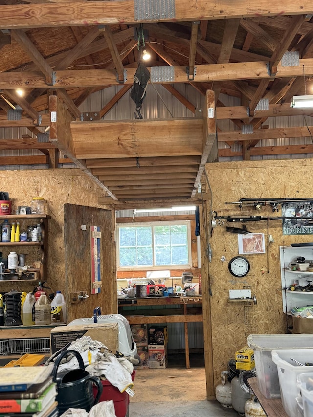 17924 Round Lake Rd, Wellston, MI 49689 - misc room featuring unfinished concrete flooring and a workshop area