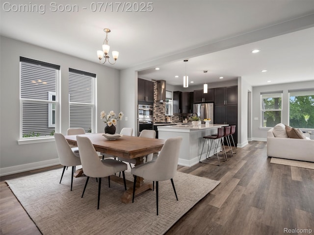 482 Wilson St, Ferndale, MI 48220 - dining area with a chandelier, wood finished floors, and recessed lighting