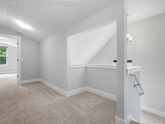 482 Wilson St, Ferndale, MI 48220 - carpeted spare room featuring vaulted ceiling and baseboards