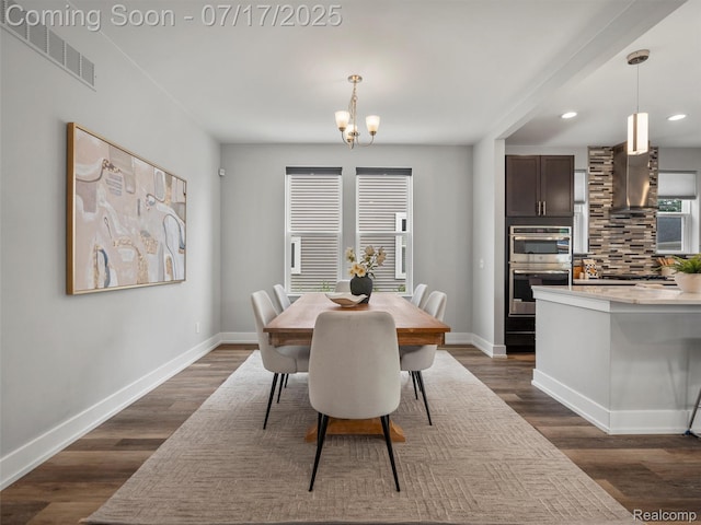482 Wilson St, Ferndale, MI 48220 - dining area with a chandelier, recessed lighting, and dark wood-type flooring