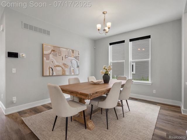 482 Wilson St, Ferndale, MI 48220 - dining area with a chandelier and wood finished floors
