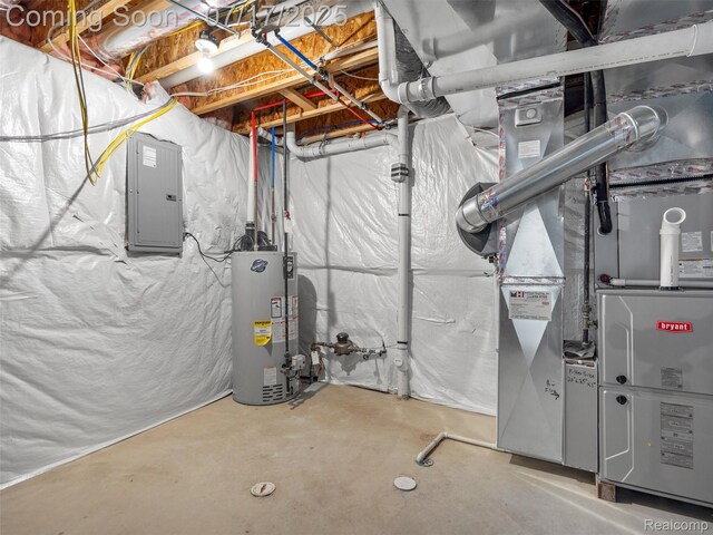 482 Wilson St, Ferndale, MI 48220 - unfinished below grade area featuring electric panel, gas water heater, and heating unit