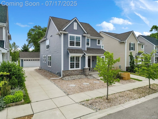 482 Wilson St, Ferndale, MI 48220 - traditional home featuring an outbuilding, a detached garage, and a shingled roof