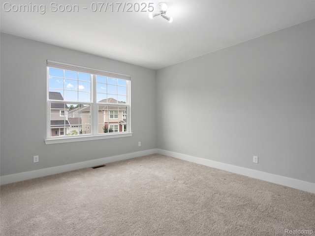 482 Wilson St, Ferndale, MI 48220 - carpeted spare room featuring baseboards