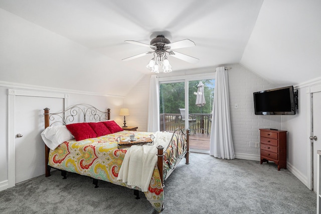 2430 140th Ave, Dorr, MI 49323 - carpeted bedroom with access to exterior, lofted ceiling, and a ceiling fan