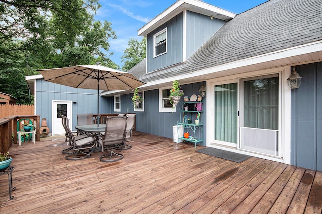 2430 140th Ave, Dorr, MI 49323 - wooden terrace featuring outdoor dining space