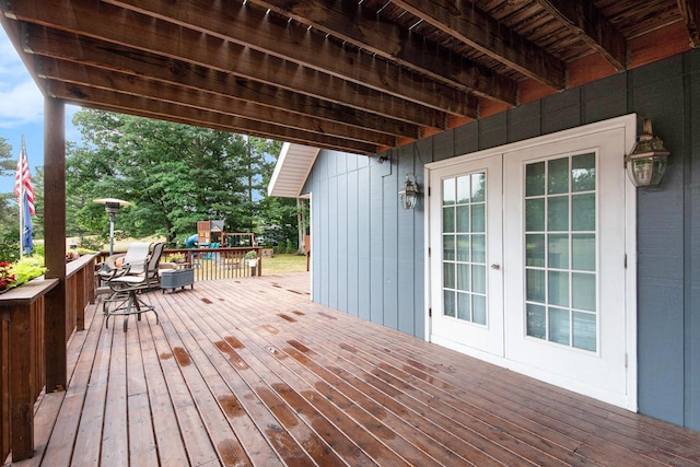 2430 140th Ave, Dorr, MI 49323 - wooden terrace featuring french doors