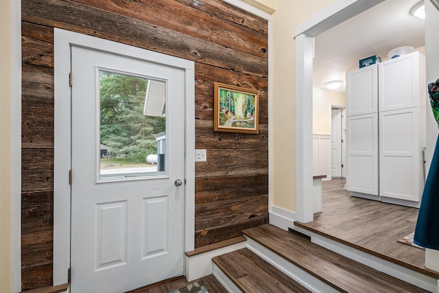 2430 140th Ave, Dorr, MI 49323 - entryway with wood walls and wood finished floors