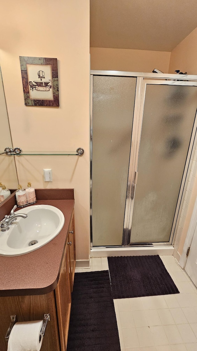 157 Carson Dr Unit 175, Westland, MI 48185 - full bath with vanity, a shower stall, and tile patterned flooring