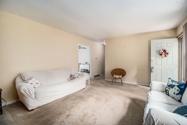 1560 G Ave W, Kalamazoo, MI 49009 - living area with carpet and baseboards