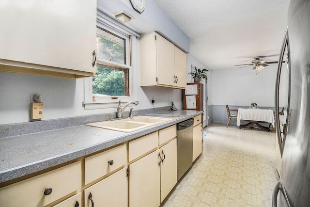 1560 G Ave W, Kalamazoo, MI 49009 - kitchen featuring appliances with stainless steel finishes, a ceiling fan, and light countertops