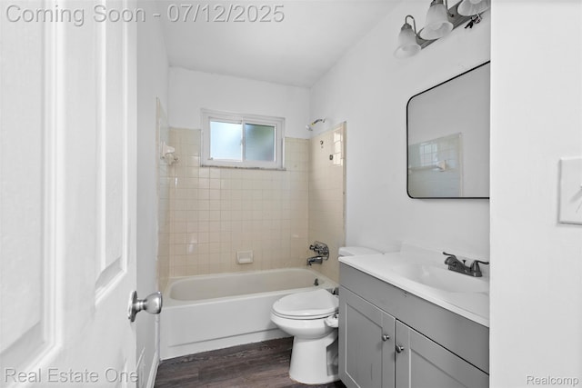 15679 Gulley St, Taylor, MI 48180 - bathroom featuring vanity, shower / bathtub combination, and wood finished floors
