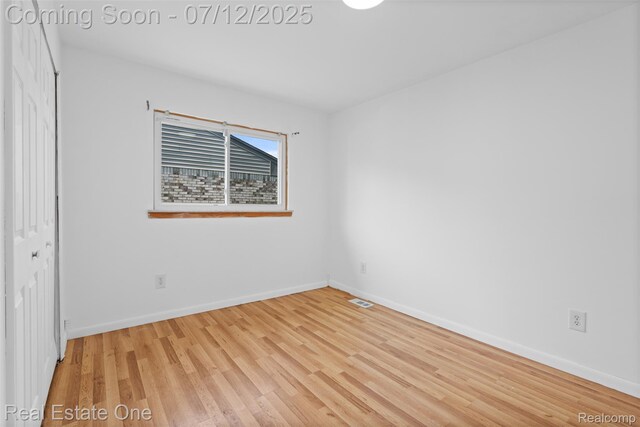 15679 Gulley St, Taylor, MI 48180 - spare room featuring light wood-style flooring and baseboards