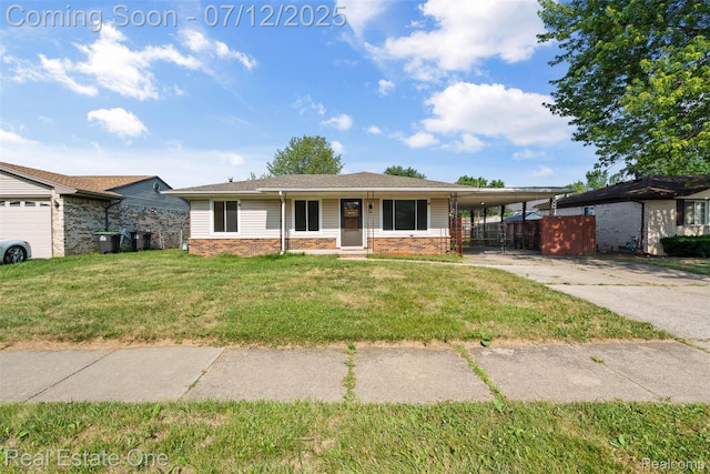 15679 Gulley St, Taylor, MI 48180 - view of front facade with brick siding, concrete driveway, a carport, and a front lawn
