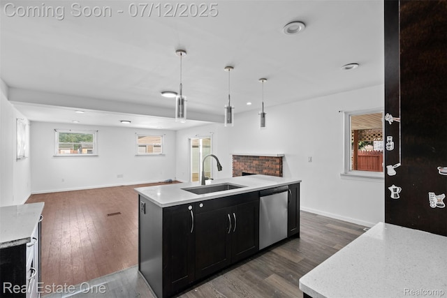 15679 Gulley St, Taylor, MI 48180 - kitchen featuring dishwasher, dark cabinets, open floor plan, a center island with sink, and recessed lighting