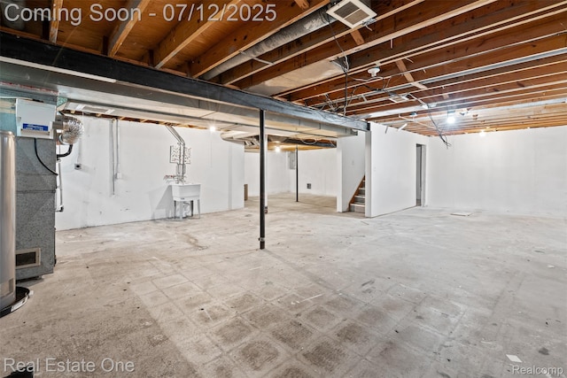 15679 Gulley St, Taylor, MI 48180 - unfinished basement with stairs and a sink